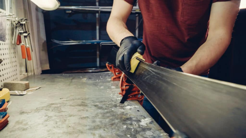 A man sharpening skis