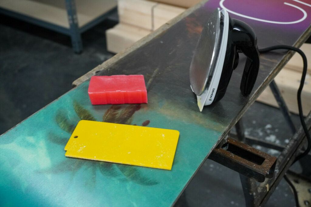 Items required to wax a snowboard